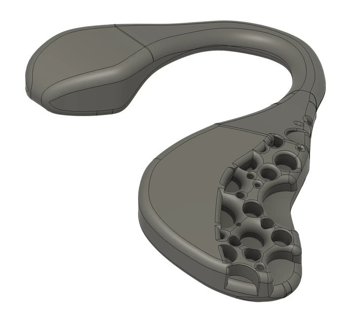 Isometric CAD view of the earpiece showing the latticed inner structure