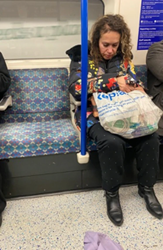 Person sleeping on tube